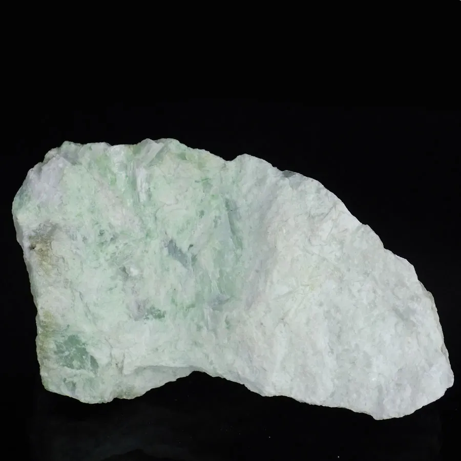 Chrome Diopside In A Calcite And Tremolite Matrix